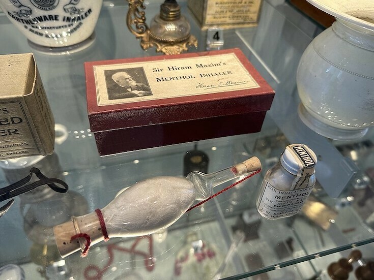 An inhaler with a box labelled Hiram Maxim's Menthol Inhaler