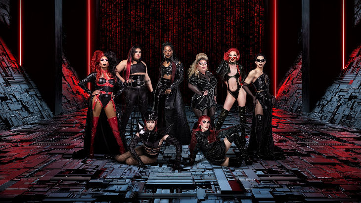 Six drag queens posing in black leather outfits