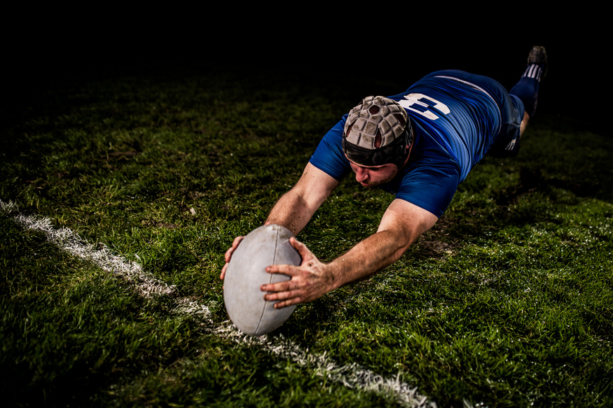 Where to watch the Rugby World Cup in London: A player in blue scoring a try